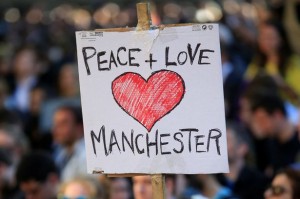 people-attend-a-vigil-for-the-victims-of-an-attack-on-concert-goers-at-manchester-arena-in-central